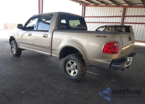 2003 Ford F-150 Lariat/Xlt z USA, uszkodzony, nr VIN 1FTRW08LX3KA14209